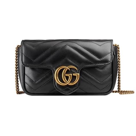 gucci bag 3210990|GG Emblem super mini bag in black leather.